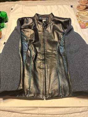 Koos of course! Mixed Media Leather and Tweed Jacket with Blue Leopard Trim